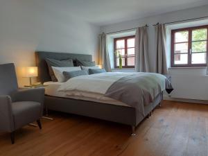 Marxhof Seebruck am Chiemsee客房内的一张或多张床位