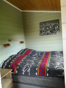 Davvi Siida - Reindeer Design Lodge客房内的一张或多张床位