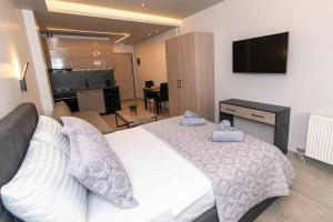 Kastalia Living Thessaloniki客房内的一张或多张床位
