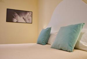 Apt Bellagio DolceVita客房内的一张或多张床位
