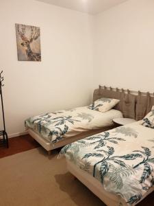 Appartement Gaudi centre historique Perpignan客房内的一张或多张床位