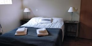 SAXA Guesthouse客房内的一张或多张床位