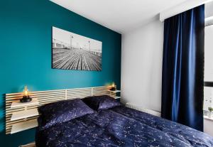 SUNRISE HOME APARTMENTS - LIGHTHOUSE客房内的一张或多张床位