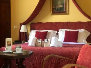 乐克西欧别墅Il酒店客房内的一张或多张床位
