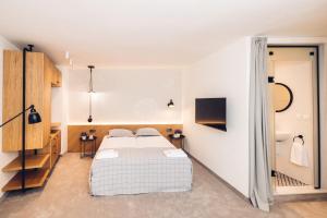 Antares City Sozopol客房内的一张或多张床位