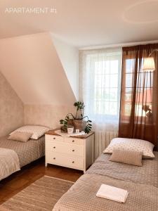 Apartamenty 72 - Agroturystyka客房内的一张或多张床位