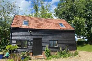 DepdenGorgeous comfortable barn with huge private orchard in quiet Suffolk location的相册照片
