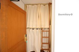 THE NEXT DOOR Dormitory & Private Hostel客房内的一张或多张双层床