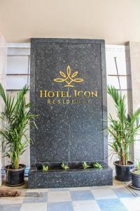 钦奈Icon Residency的度假村酒店客房的标志