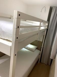 Share Inn Appartements客房内的一张或多张双层床