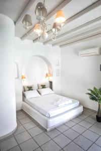 Onar Hotel & Suites客房内的一张或多张床位