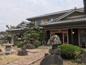 オーベルジュ美の浜 流石外面的花园