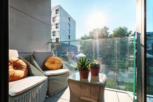 SASKI apartament PREMIUM Unia Art Residence HOME & SPA CENTER "best view"的休息区