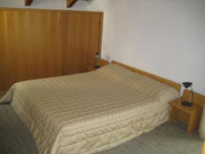 Appartamenti Decrestina客房内的一张或多张床位