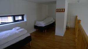 豪达特恩酒店客房内的一张或多张床位