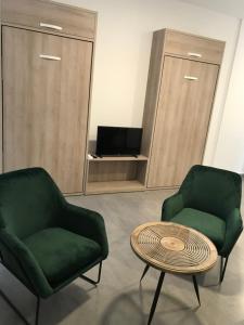 Apartamentos Ad Theatrum的休息区