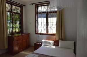Barazani Garden Villa客房内的一张或多张床位