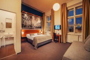 Metropolitan Old Town Hotel - Czech Leading Hotels客房内的一张或多张床位