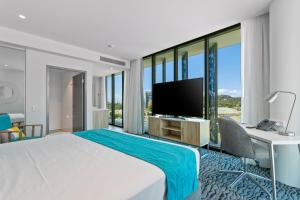 Rydges Gold Coast Airport客房内的一张或多张床位