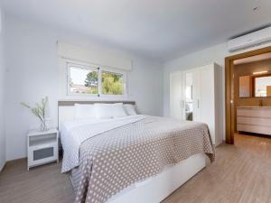Holiday Home Eldorado Playa 139 by Interhome客房内的一张或多张床位
