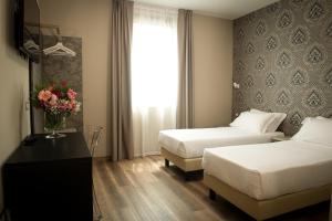 德拉罗萨酒店客房内的一张或多张床位