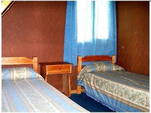 香桃木山林小屋客房内的一张或多张床位