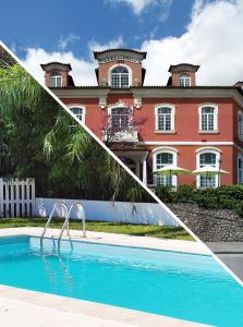 库里亚Hotel Do Parque, Boutique Hotel - Curia的一座大房子前面的游泳池
