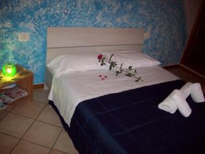 扎菲洛蓝光机场酒店客房内的一张或多张床位