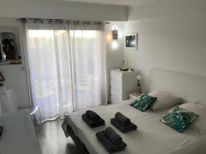 Apartment Cannes Rico Beach客房内的一张或多张床位