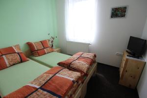 Penzion Malaika客房内的一张或多张床位
