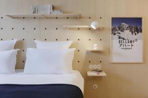 Appart'hôtel Bellamy Chamonix客房内的一张或多张床位