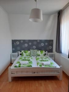 Gabi Apartmanház客房内的一张或多张床位