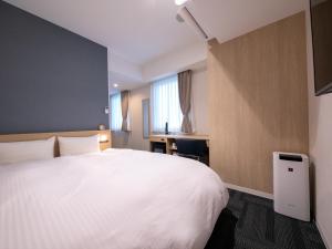 Hotel Best Price Kochi客房内的一张或多张床位