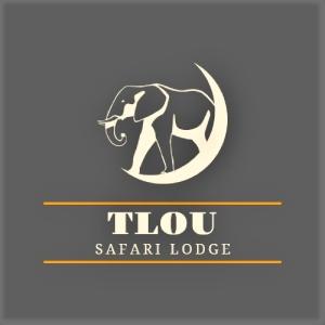 卡萨内Tlou Safari Lodge的一只大象站在圆环标志上
