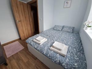 Apartament Łąki18客房内的一张或多张床位