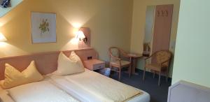 富罗瑙全景酒店客房内的一张或多张床位