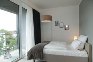 PM-AM Apartments GmbH客房内的一张或多张床位