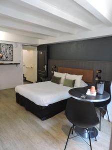 Icône Hôtel - Annecy客房内的一张或多张床位