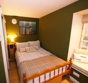 Arrochar Alps Apartment客房内的一张或多张床位