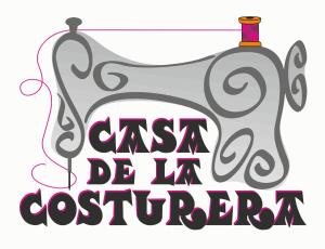 普里埃格·德·科尔多巴Casa de La Costurera的海报上挂着狗,求知之词犹如保镖