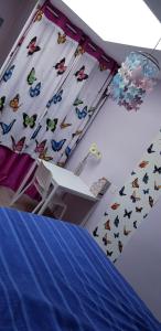 艾马尔格Butterfly Bedroom in Sweet Home的相册照片