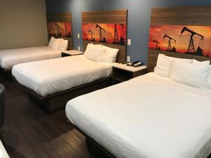 布雷亚海兰汽车旅馆客房内的一张或多张床位