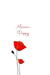 奥斯塔Maison Poppy的两朵红花的照片,上面写着曼森紫字