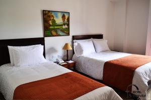 Hotel La Plazuela客房内的一张或多张床位