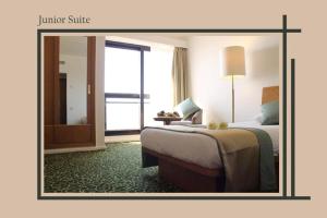 亚历山大广场酒店客房内的一张或多张床位