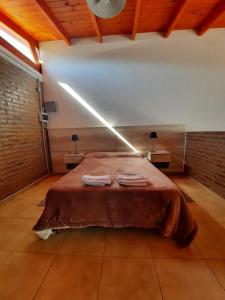 Cabañas El Aromo客房内的一张或多张床位