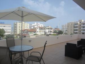 海滨211公寓式酒店的阳台或露台