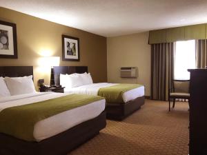 NavajoLand Hotel客房内的一张或多张床位