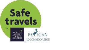 开普敦Pelican Accommodation Ottery的绿色圆圈,带有安全旅行标志