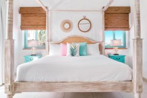 Boardwalk Boutique Hotel Aruba - Adults Only客房内的一张或多张床位